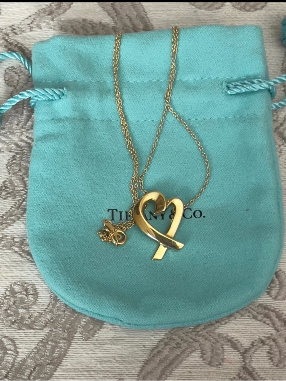 Tiffany & Co. Gold Ribbon Heart Necklace on Gold Chain